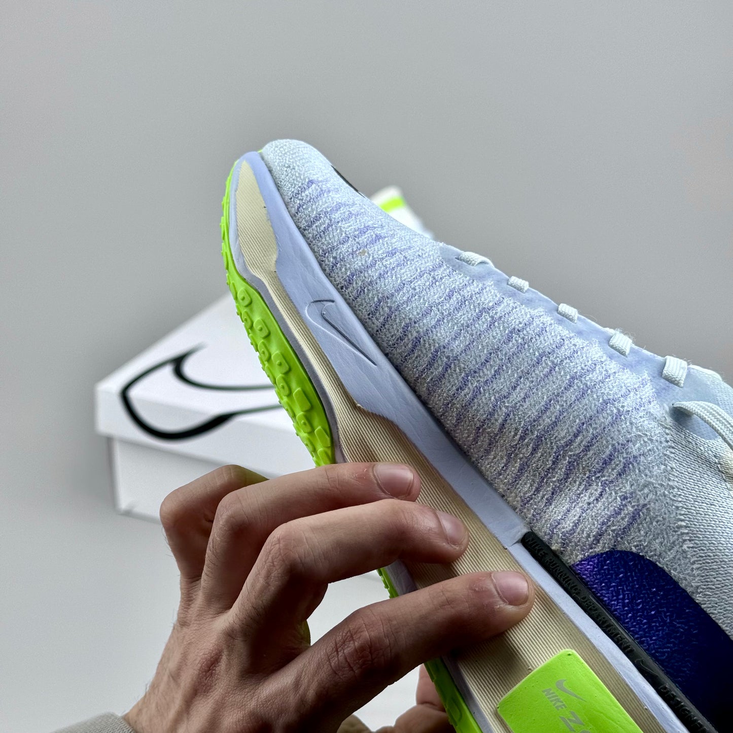 Zoomx invincible run 3 green and blue
