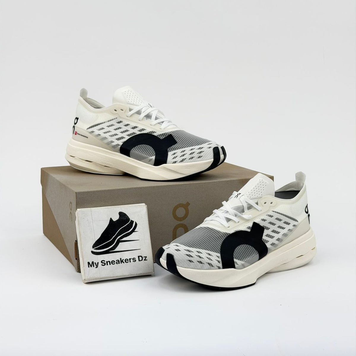 On Cloudboom Strike White Black