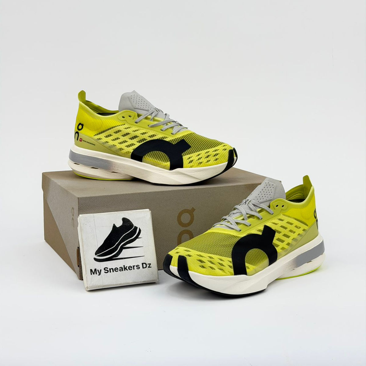 On Cloudboom Strike Yellow
