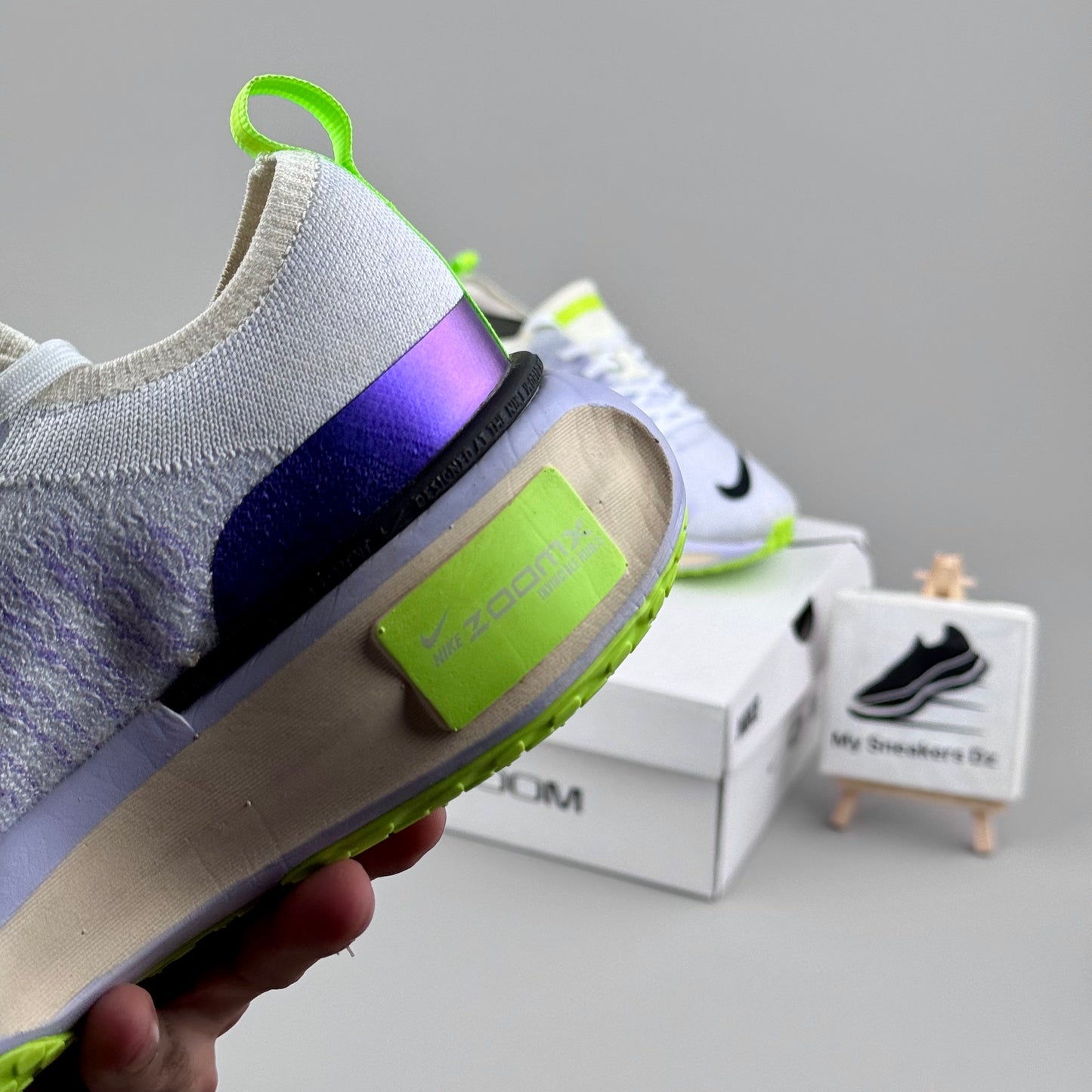 Zoomx invincible run 3 green and blue
