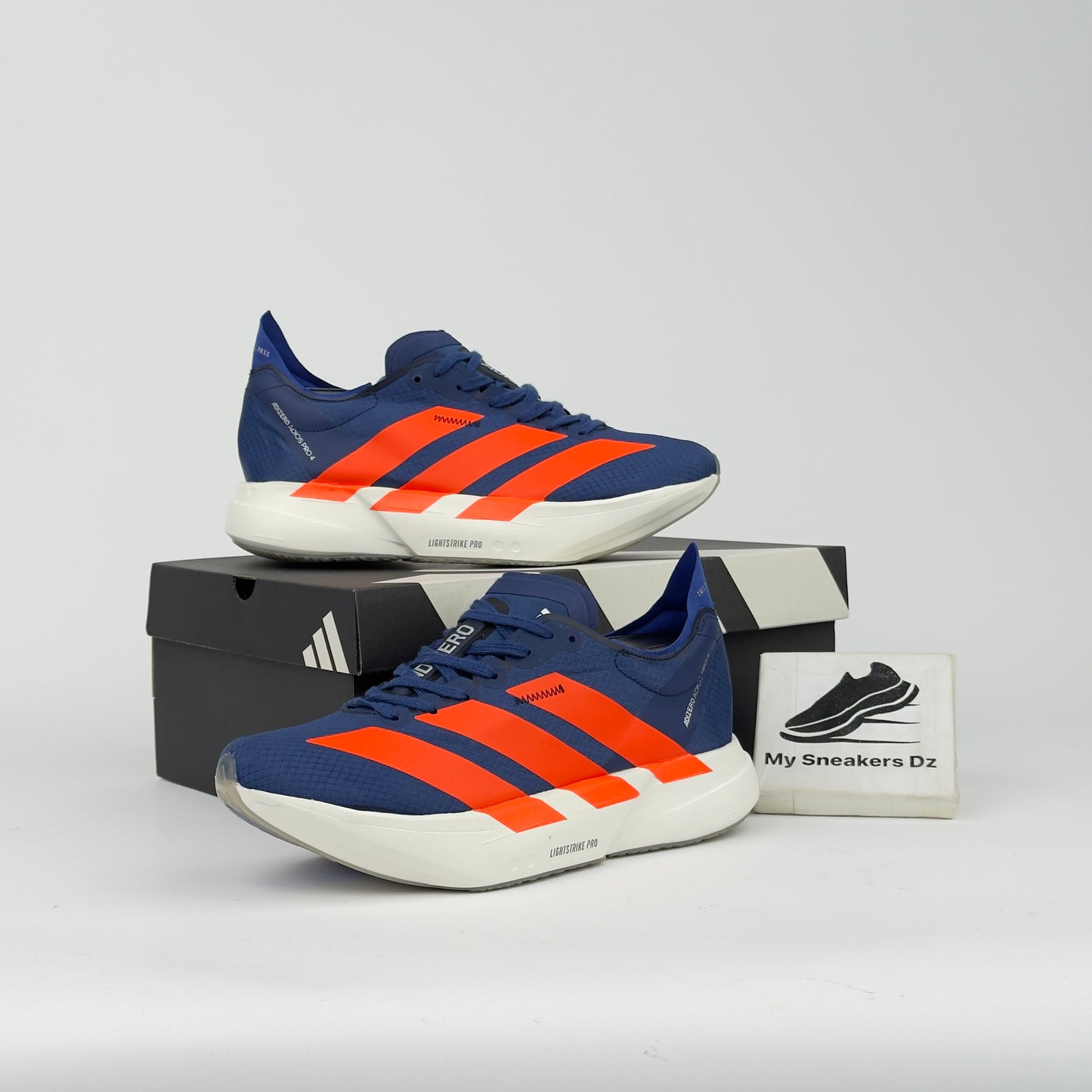 Adizero pro4 dark blue orange