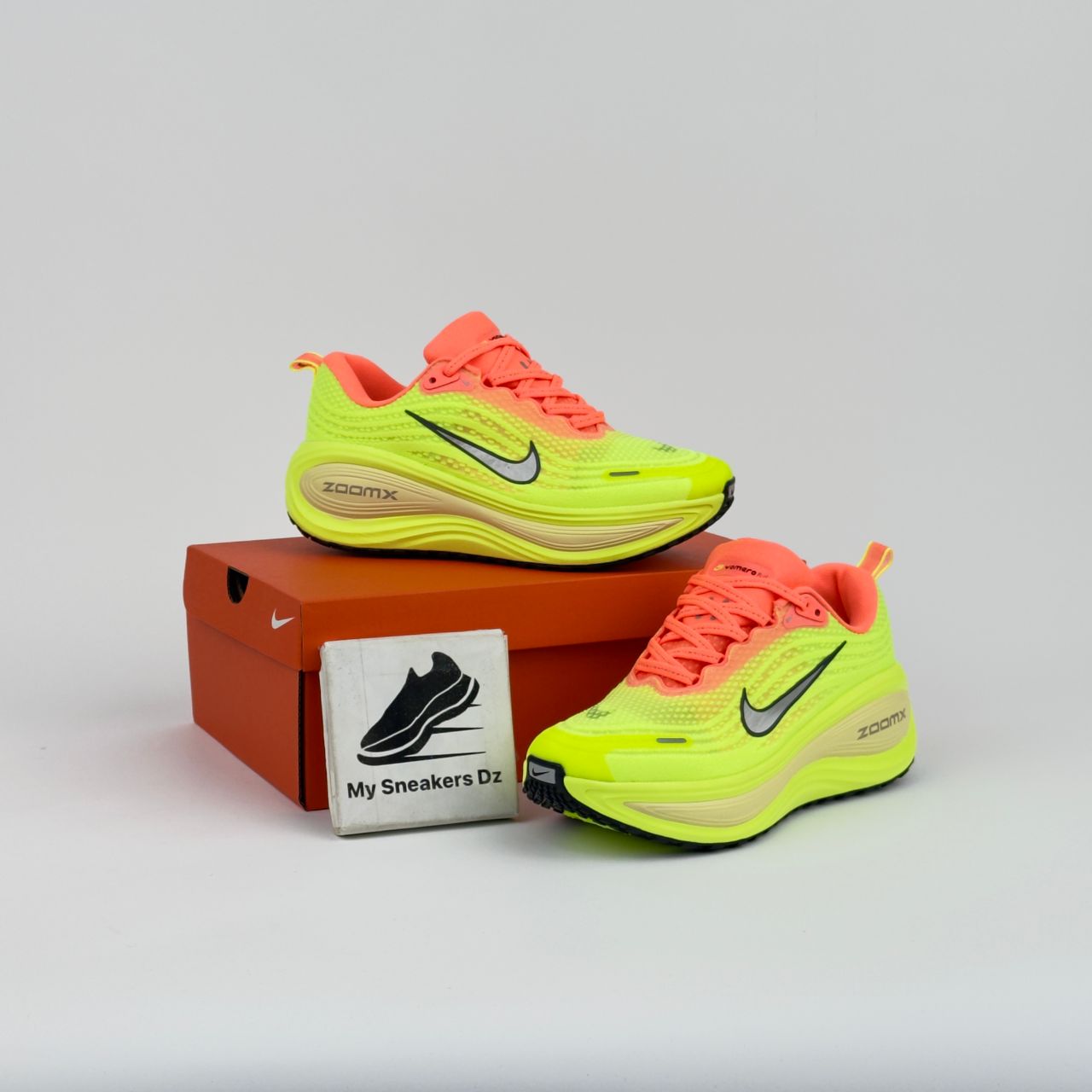 Vomero 18 plus vert pistache orange